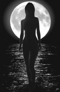 Woman in harmony with the moon and her cycles