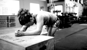 Rebecca Koch catches her breath after a workout at Crossfit Syndicate June 19, 2014. Photograph by Tom Speruto